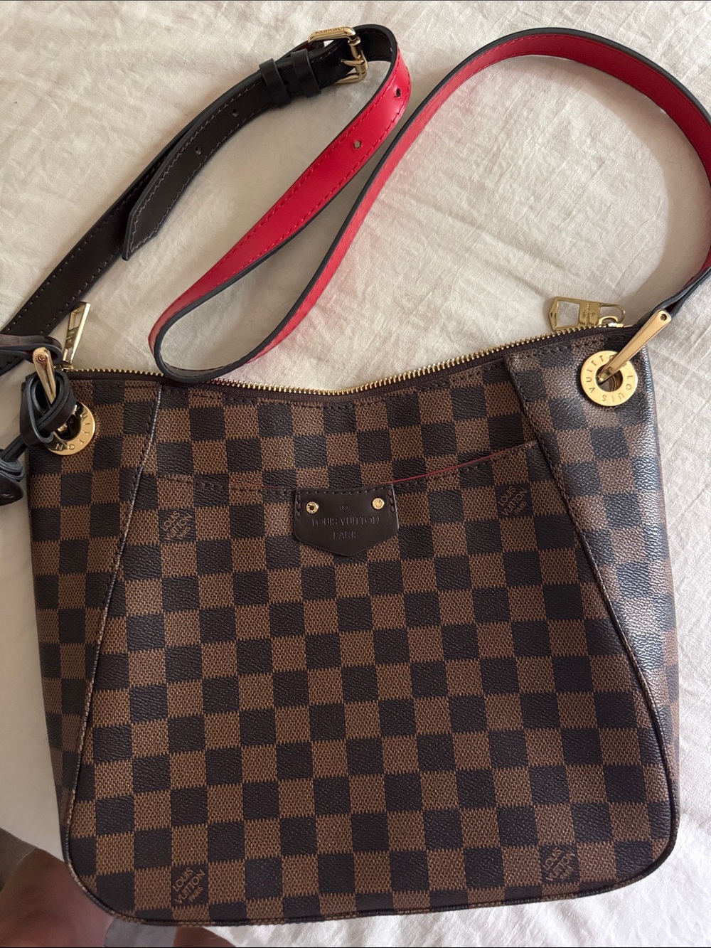 Brown Checkered Crossbody Bag with Red-Trim Strap
